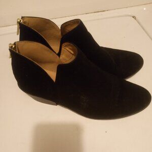 Black zip up in back boots.